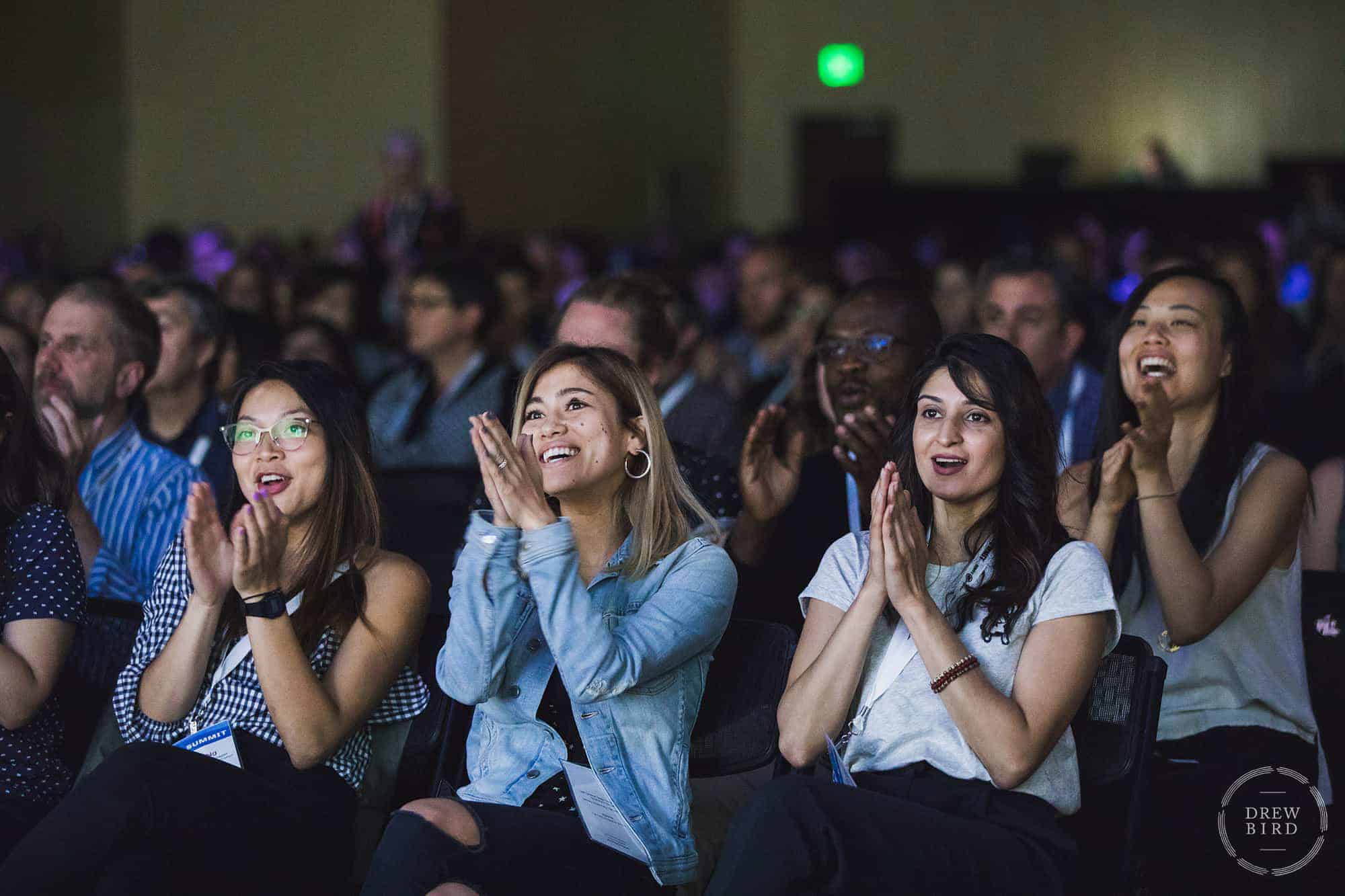 Photo of audience clapping at a corporate event in San Francisco from Oakland based photographer Drew Bird.