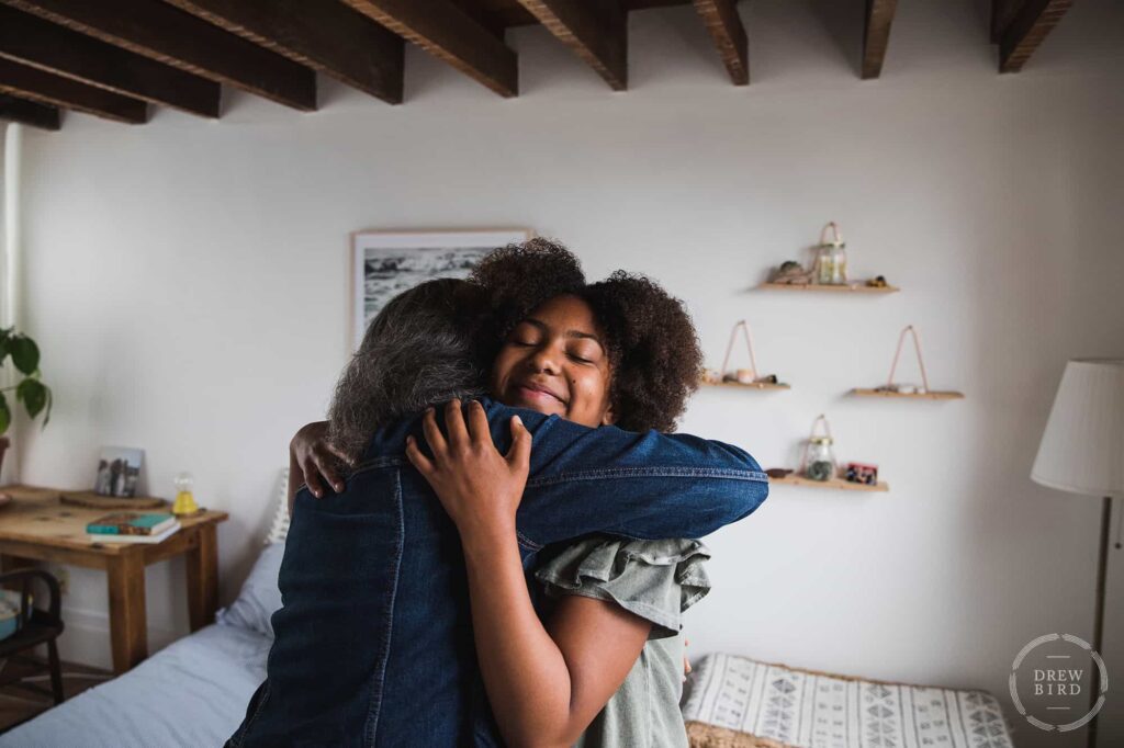 Photo of two people embracing from a movie set. This is still photo is part of San Francisco based photographer Drew Bird's movie set unit stills services.