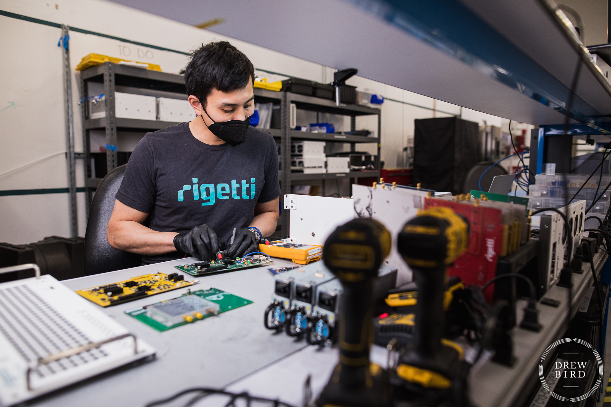 An engineer works to assemble a quantum computer processor at Rigetti in Berkeley, California. Corporate photography by Drew Bird.