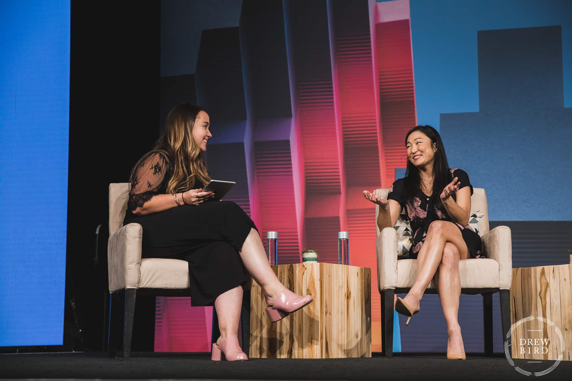 Two women have a panel discussion as keynote speakers. The Phoenician Resort - a luxury resort in Scottsdale, Arizona.